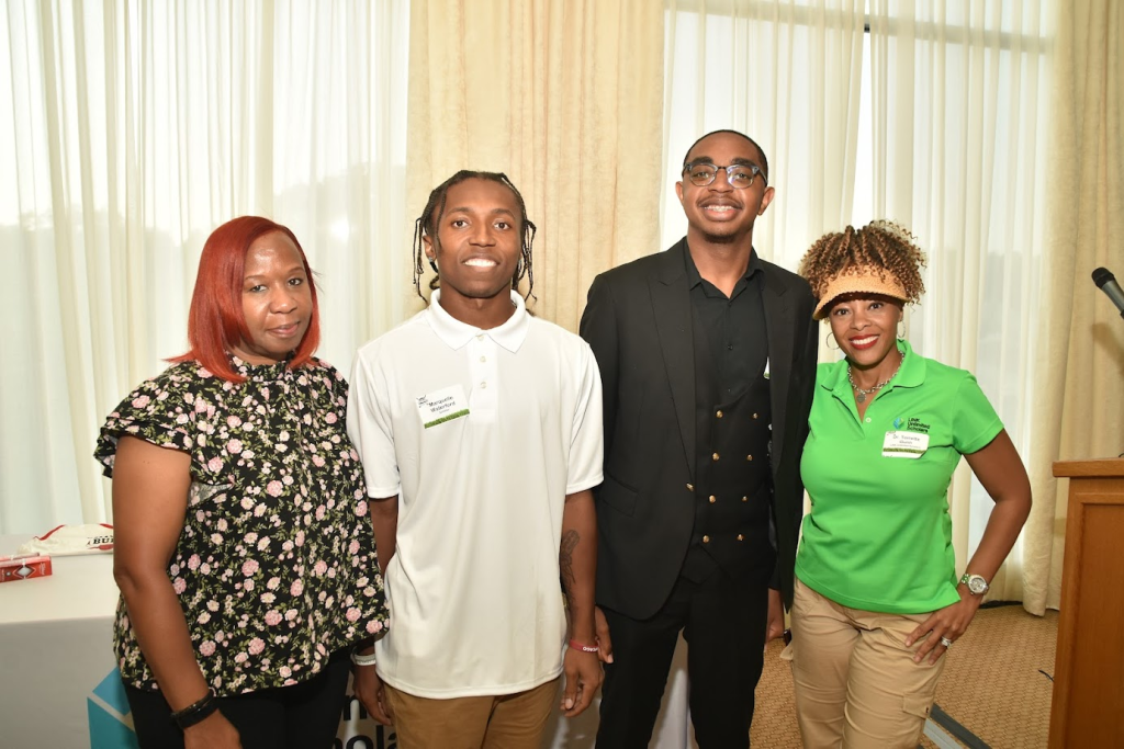 Angela, Marquelle, and Tamaine with Dr. Gunn